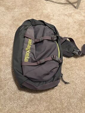 Patagonia Black and Gray Sling Pack with Lime Logo